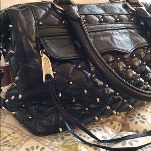 Rebecca Minkoff.  Dust bag  Very cute. Unique.